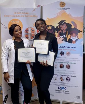 two female having an award