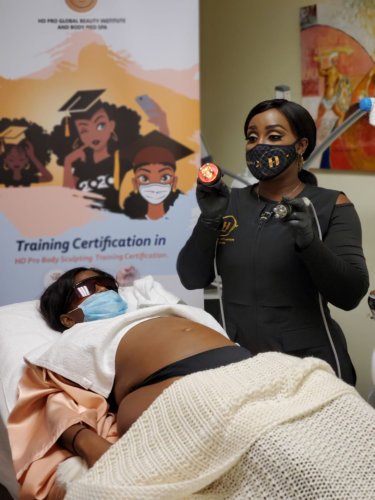 doctor having a demo on how to use the equipment